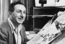 Mr Walt Disney sits at his drawing board in his studio, drawing a sketch of Mickey Mouse